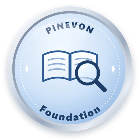 Foundation level badge: a silver and blue medallion with an open book and a magnifying glass